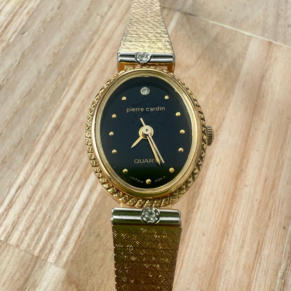 Vintage Pierre Cardin ladies oval black dial gold tone dress watch NEW BATTERY